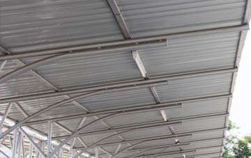 installing Bank Houses metal roofing